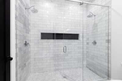 Walk-In Shower Featuring Natural Stone Walls